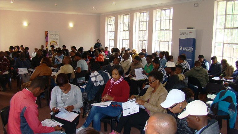 Workshop participants engaged in group activities 